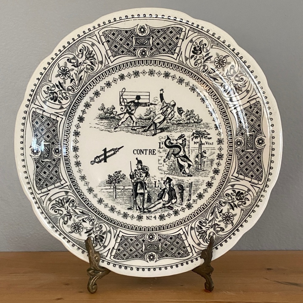Antique Gien "Rebus" series transferware plate, number 4.